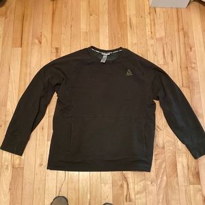 Reebok men’s crew neck sweatshirt with pocket in front. Size XL